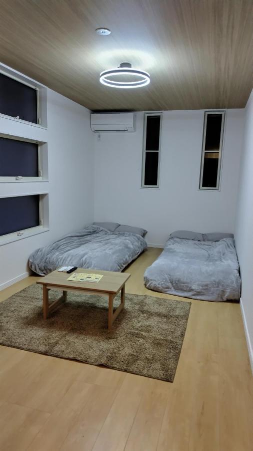 Guest House Daruma Anan Esterno foto