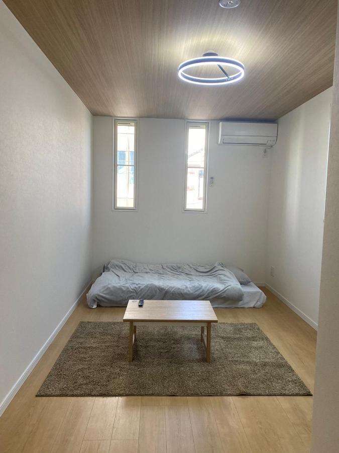 Guest House Daruma Anan Esterno foto